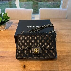 Chanel Black Quilted Caviar Jumbo Classic Double Flap Gold Hardware